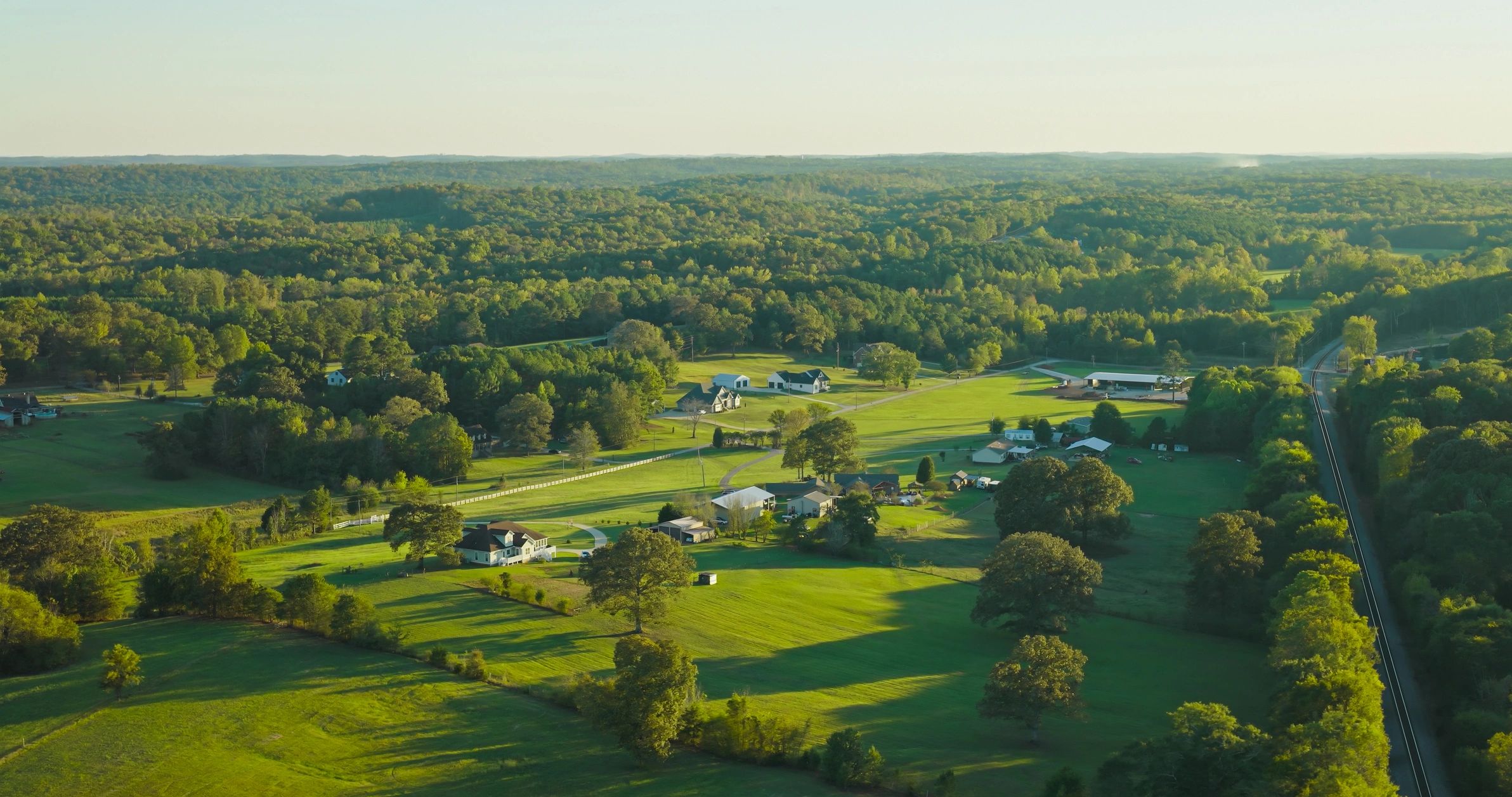 Aerial view of farmland and pasture landscape